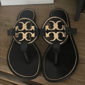 Tory Burch Black Sandals with Gold Emblem